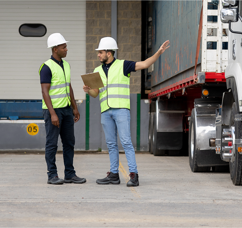 Image: Two workers and a truck